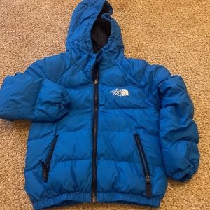 Blue winter jacket The North Face boy size XS